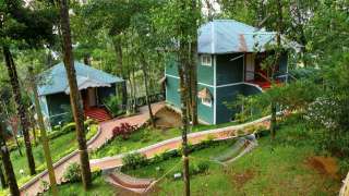 Click here to view the details of Bluebells Valley Resort - Munnar